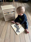 Puslespilsreol med 12 knop-puslespil