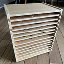 Puslespilsreol med 12 knop-puslespil