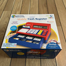 Kasseapparat med regnemaskine i plast.