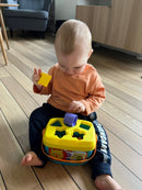 Puttekasse i plast med hank fra Fisher-Price.
