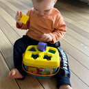 Puttekasse i plast med hank fra Fisher-Price.
