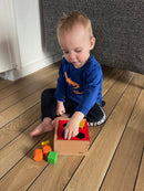 Puttekasse i træ med 8 klodser fra VIGA