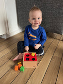 Puttekasse i træ med 8 klodser fra VIGA