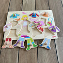 Knoppuslespil fra Goki med Dress-Up pige i træ - 10 brikker.