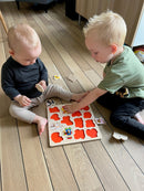 GOKI knoppuslespil i træ med 14 brikker - Fra 1 år.