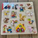 GOKI knoppuslespil i træ med 14 brikker - Fra 1 år.