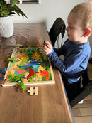 Puslespil i træ fra VIGA- Dinosaurs - 48 brikker.