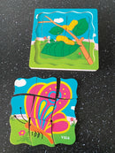 Puslespil i træ fra VIGA - Vokse Sommerfugl - 4 lag - 21 brikker. - Billede 1