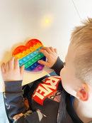 Plop Up fidgetspil - Regnbue-farvet - 1 stk - Fra 5 år. - Billede 1
