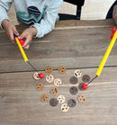 Fiskespil med ansigter og følelser.