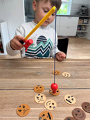 Fiskespil med ansigter og følelser.