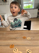 Fiskespil med ansigter og følelser.