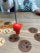 Fiskespil med ansigter og følelser.