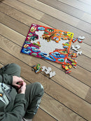 Puslespil i Pap fra Larsen - Dinosaurer - 85 brikker.