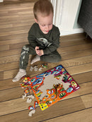 Puslespil i Pap fra Larsen - Dinosaurer - 85 brikker.